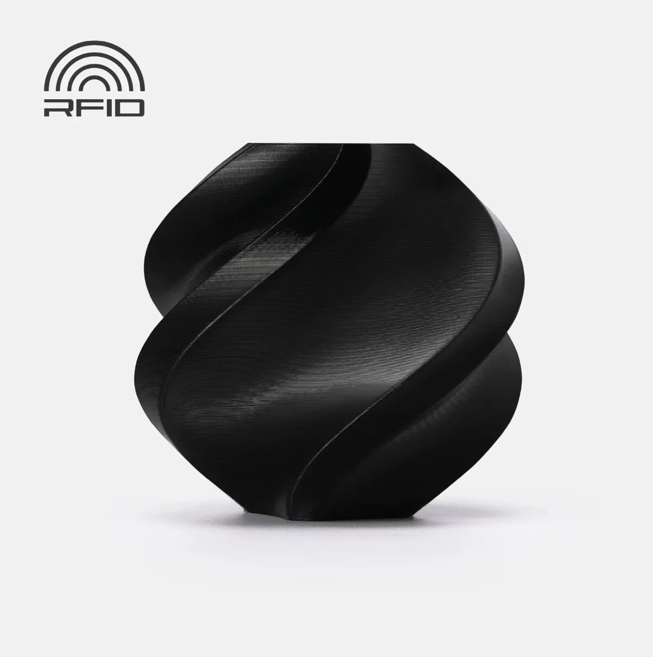 3D printed spiral geometric object in Bambu Lab Black TPU for AMS featuring RFID smart technology