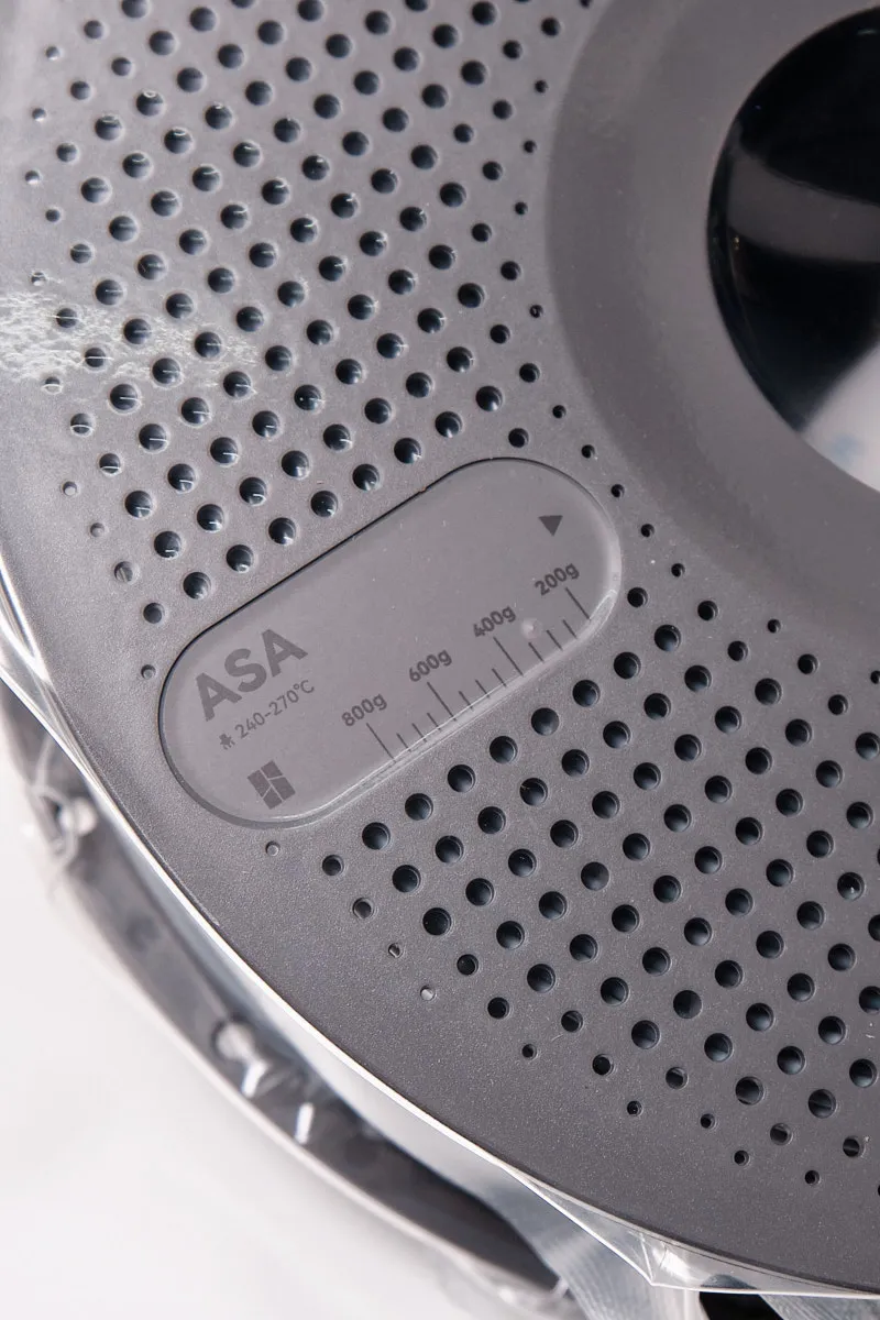 Close-up of the Bambu Lab spool weight indicator window showing ASA material and a scale from 200g to 800g.