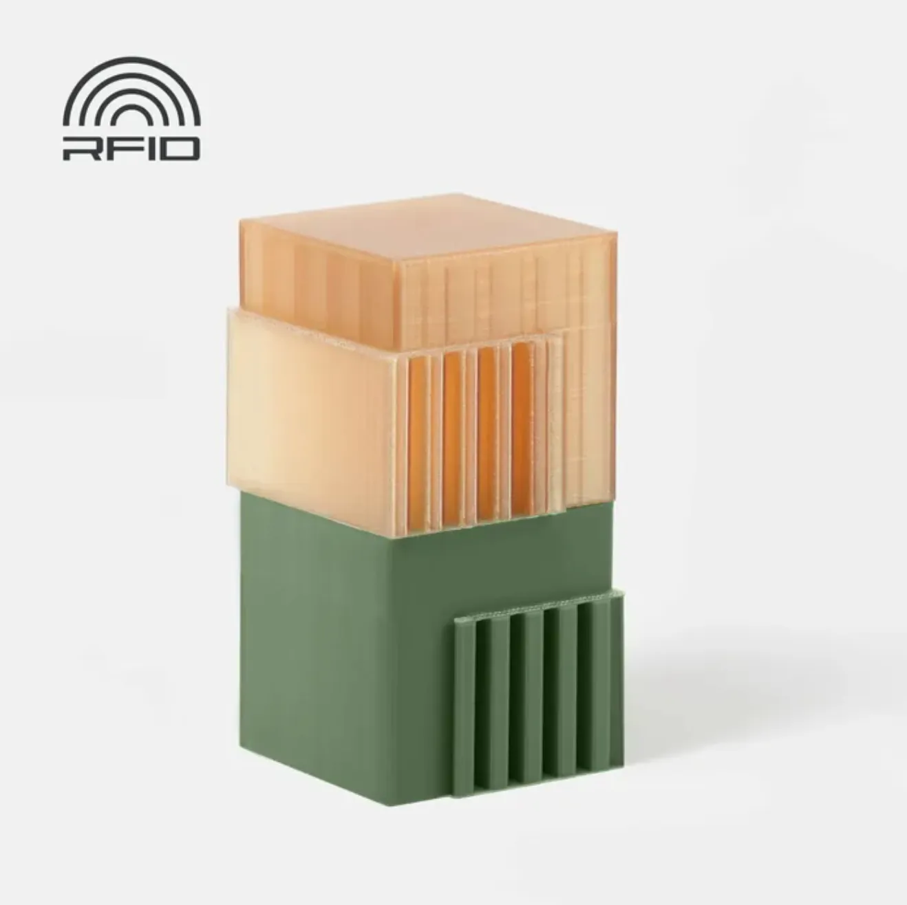 3D printed block using green PLA and nature-colored support filament with RFID technology logo for automatic material recognition.