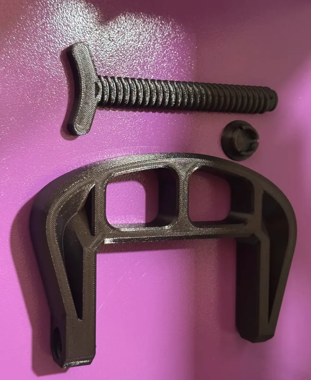 Structural clamp and threaded components printed with Bambu Lab PLA-CF Black filament 14100, showing high rigidity and precise thread definition