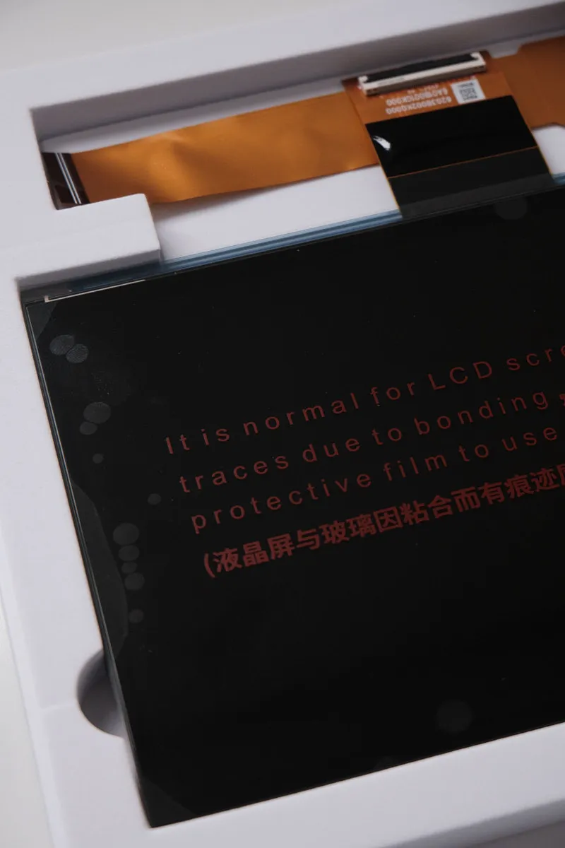 Elegoo Monochrome 12K LCD replacement screen for Saturn 4 / 4 Ultra, showing the main screen and attached ribbon cable