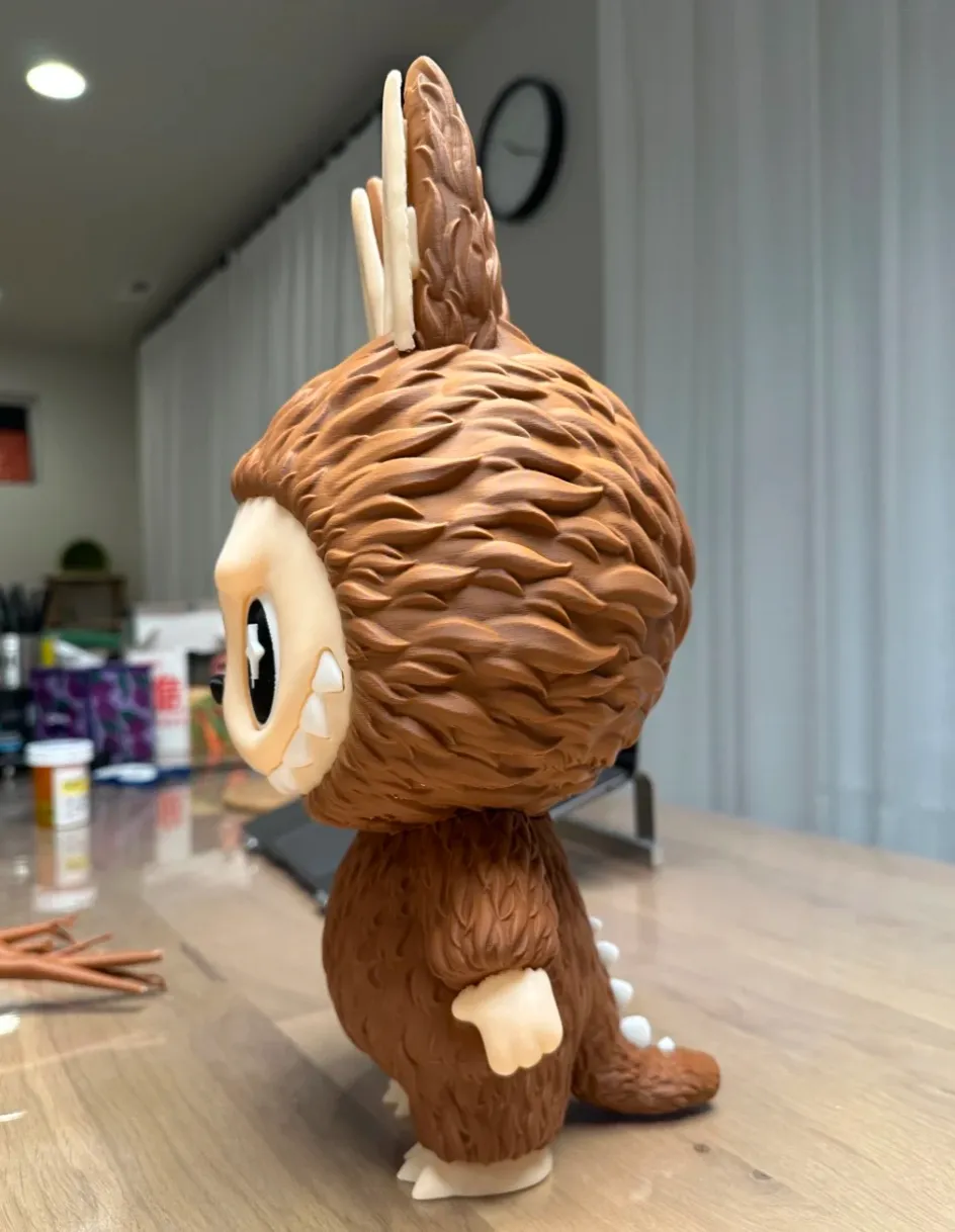 Bambu PLA Basic Brown filament 3D printed figure showing textured fur surface and layered details