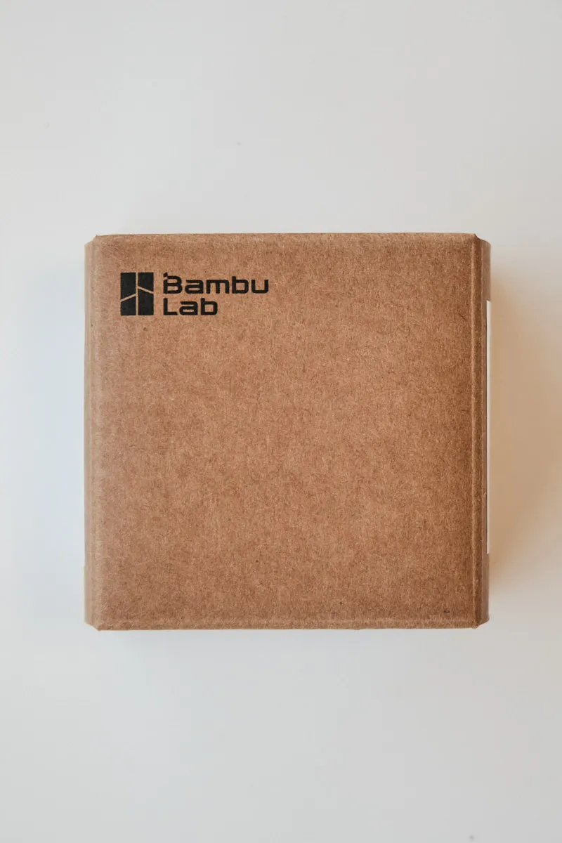 Official Bambu Lab brown cardboard packaging box with the black Bambu Lab logo, containing the A1 series hotend.