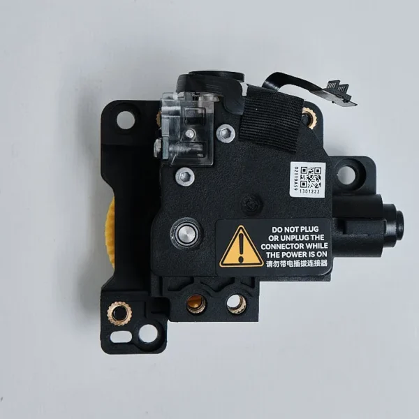 Bambu Lab P1 series extruder assembly with power safety warning label and serial QR code