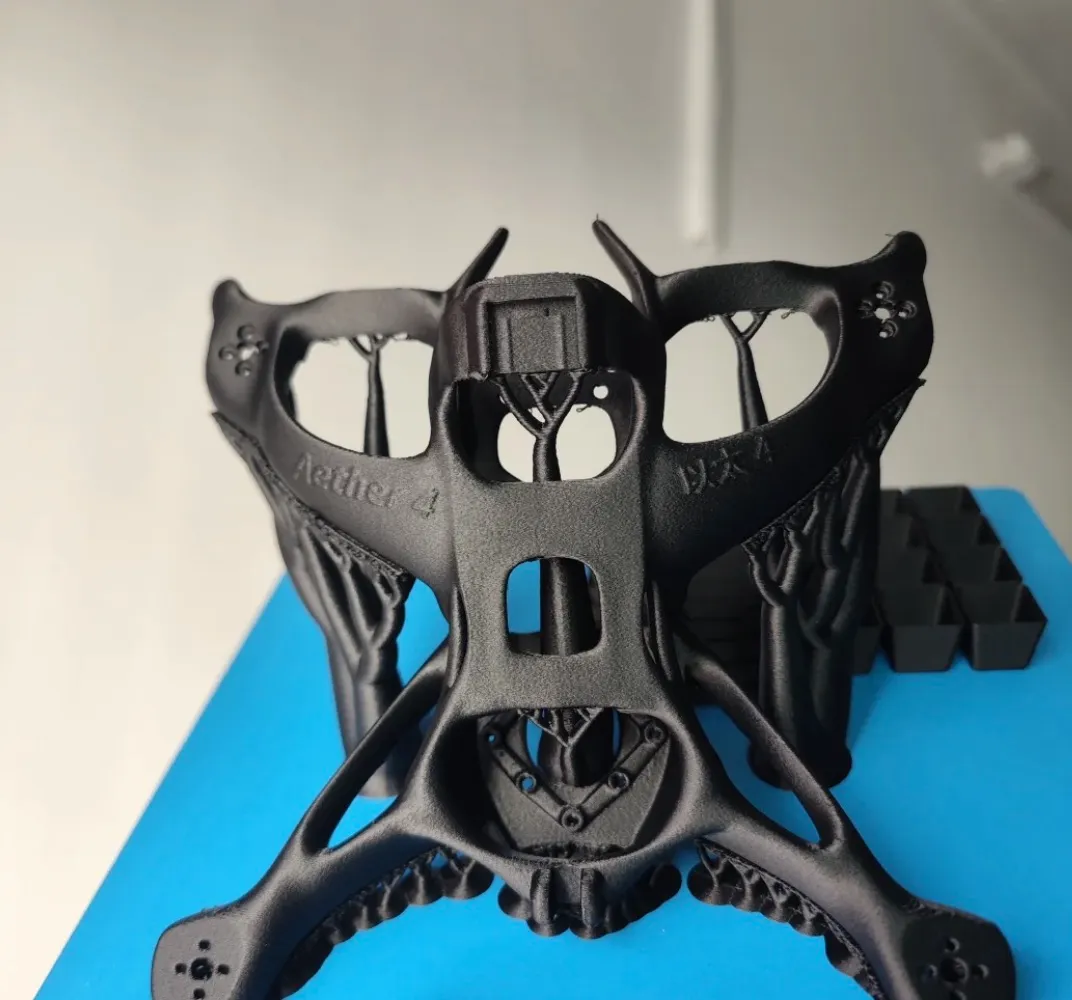 High-strength structural 3D printed part made with Bambu Lab PA6-CF 72100 carbon fiber reinforced nylon filament, featuring complex geometry and load-bearing design
