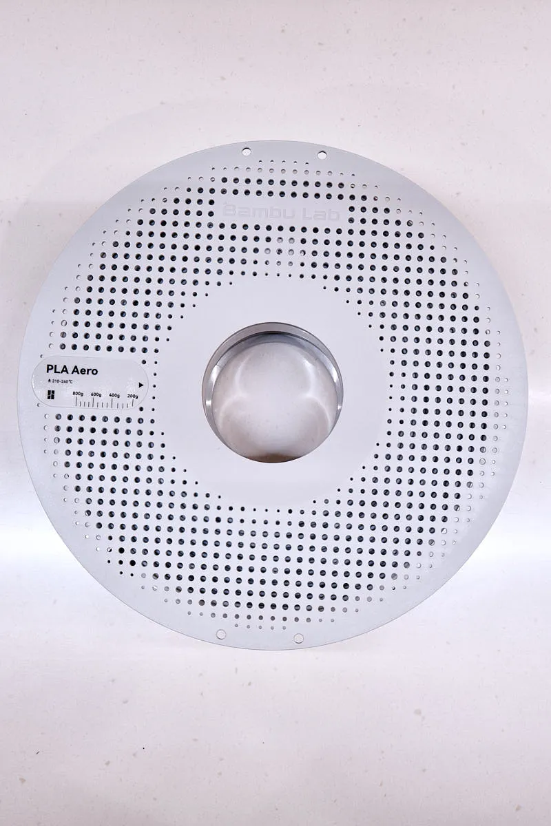 Front view of Bambu Lab PLA Aero gray filament spool showing full coil and perforated reusable spool design