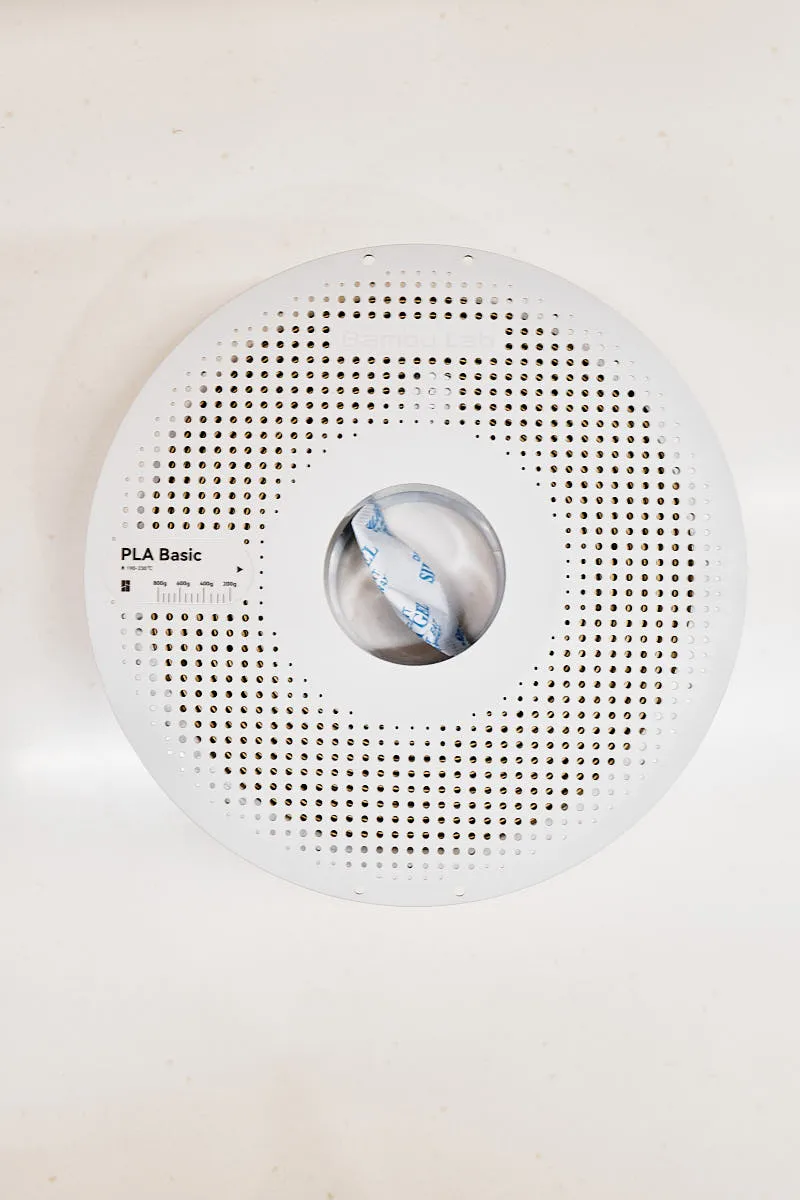 Front view of Bambu Lab PLA Basic Bronze filament spool with PLA Basic label, Color Code 10801