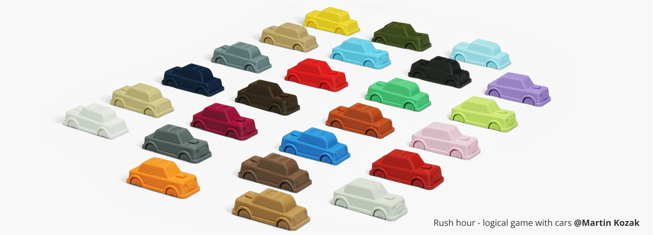 Toy cars printed with Bambu Lab PLA Matte filament in multiple colors, showing smooth matte surfaces and consistent shape accuracy