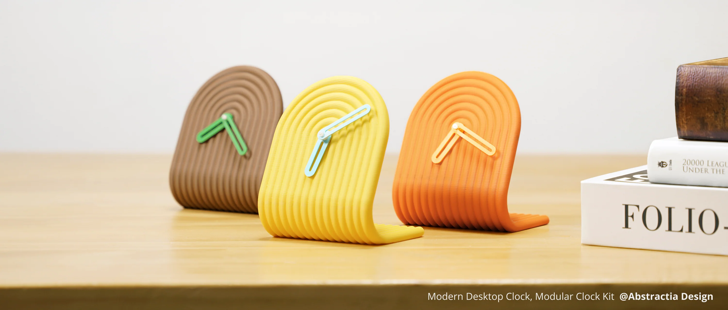 Modern desktop clock components printed with Bambu Lab PLA Matte filament, featuring soft matte finish, muted colors, and smooth layered geometry