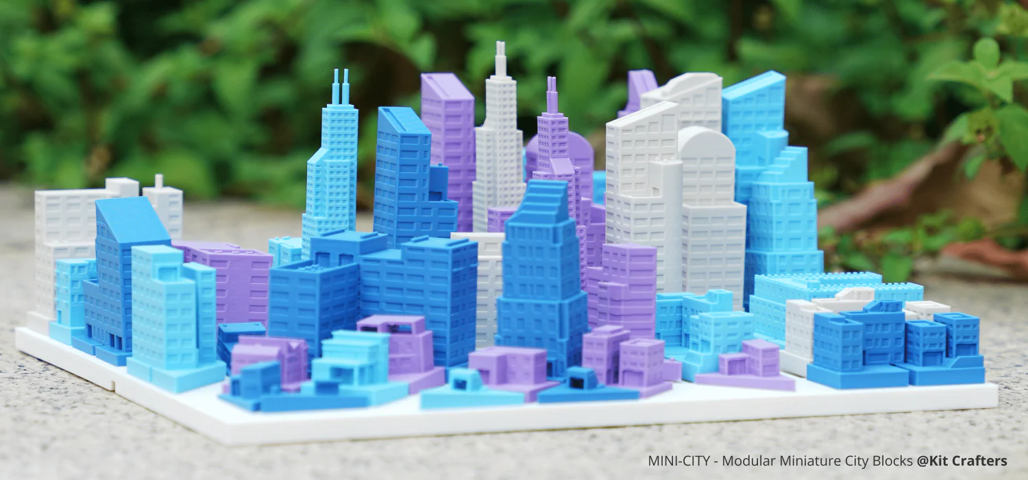 Modular miniature city blocks printed with Bambu Lab PLA Matte filament, showing soft matte surface, pastel tones, and clean architectural details