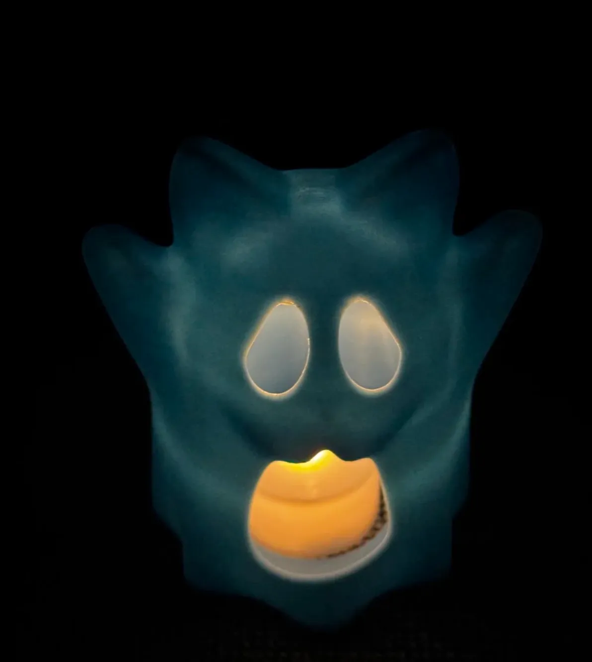 Glow-in-the-dark character night light printed with Bambu PLA Glow Blue filament 15600, softly illuminated from within