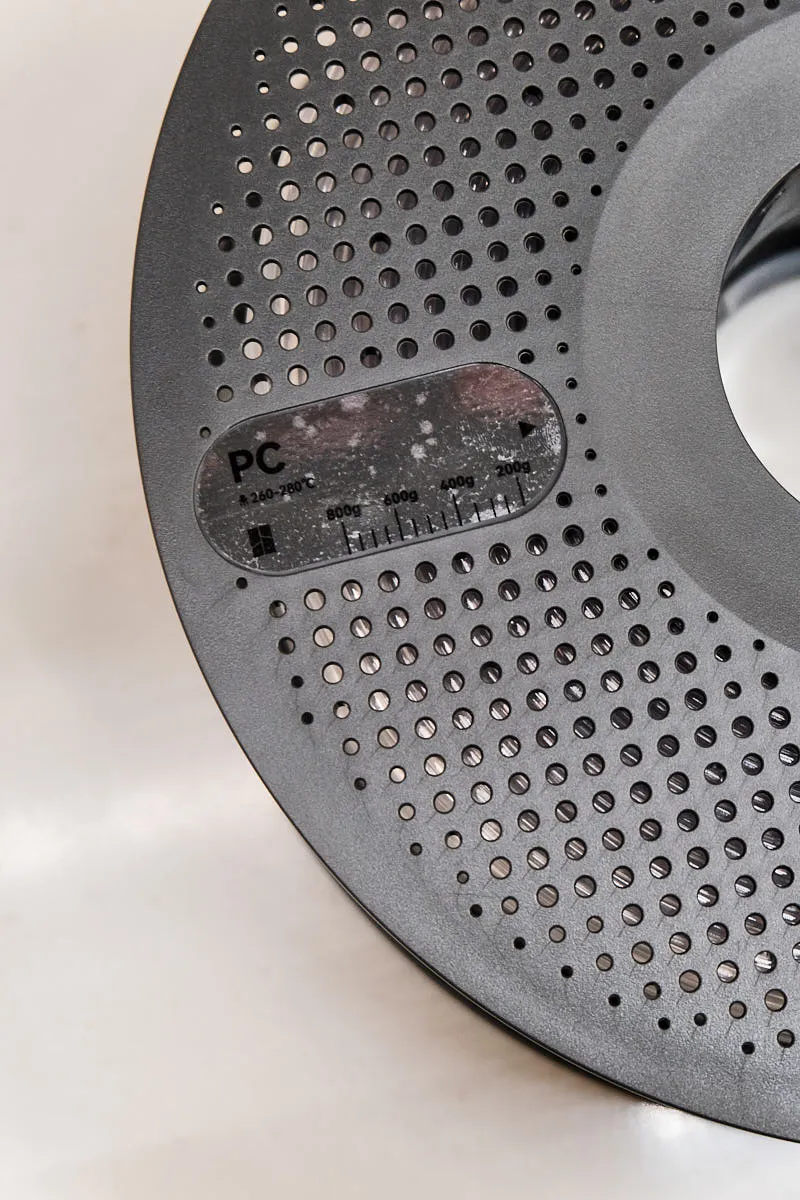 PC filament label with temperature range and weight scale on Bambu Lab spool, Color Code 60103