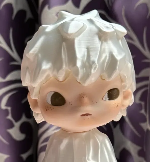 PLA Basic Beige filament 3D printed doll-style head model with smooth hair and facial details