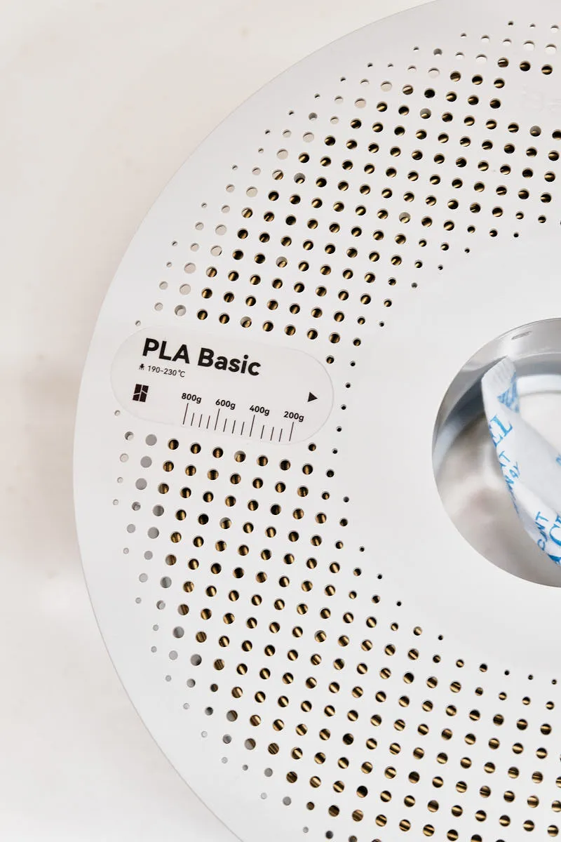 PLA Basic label and weight scale on Bambu Lab Bronze filament spool, Color Code 10801