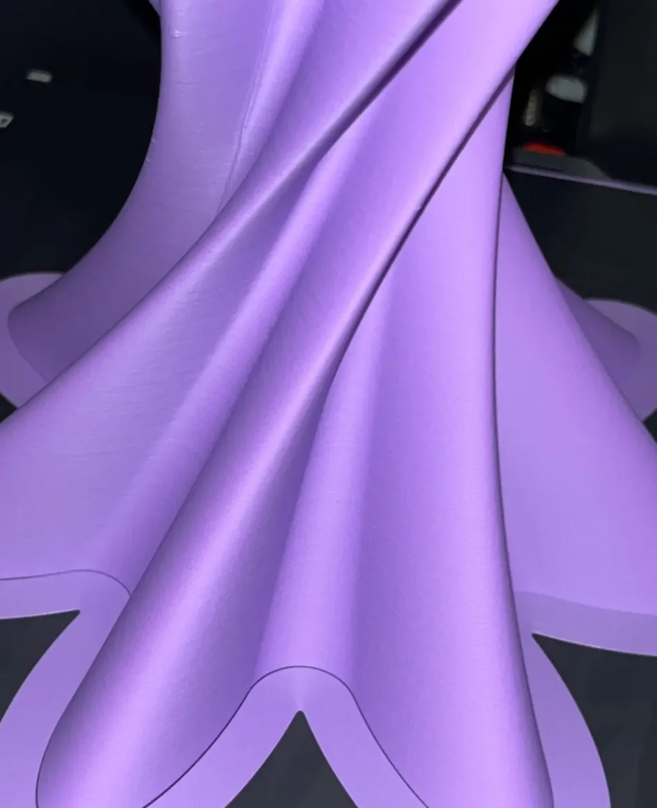 PLA Basic Purple filament 3D printed purple model with smooth flowing curved surface