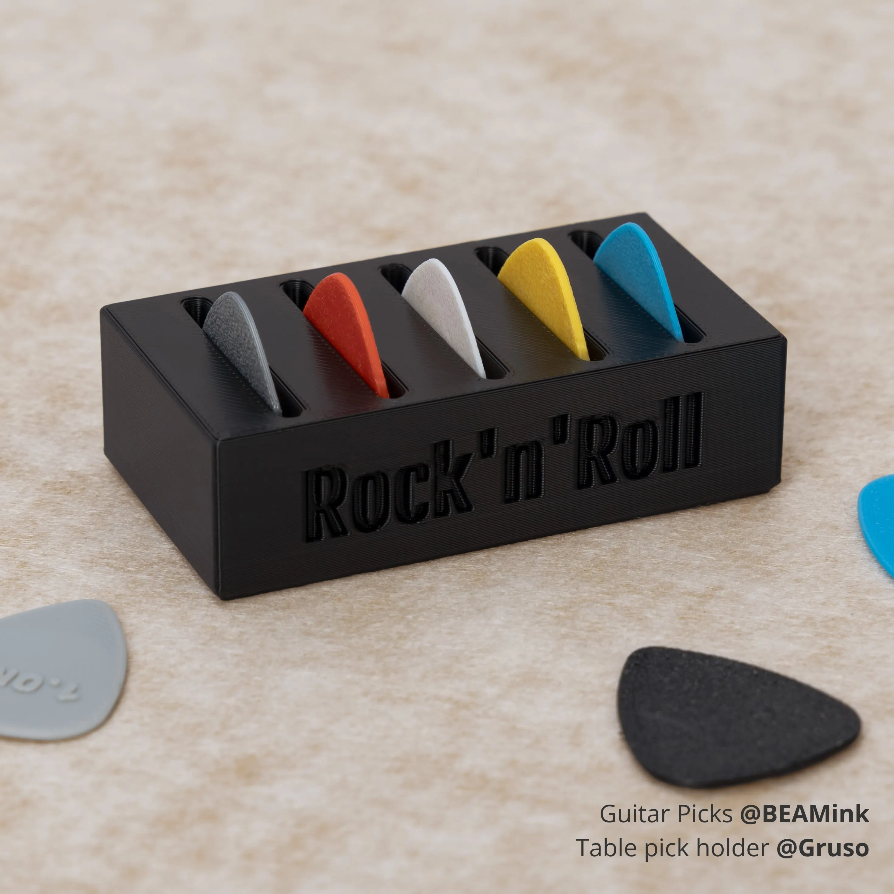 3D printed guitar picks and table pick holder made with Bambu PLA Tough+ filament