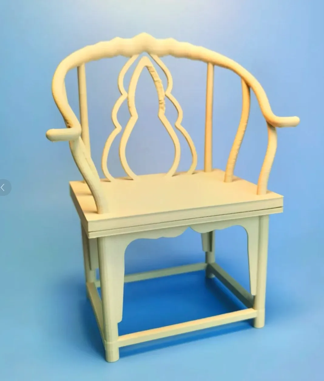 Miniature wooden-style chair 3D printed with Bambu Lab PLA Wood Classic Birch filament