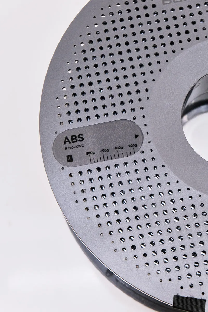 Bambu Lab ABS Silver filament spool label showing ABS material and temperature range