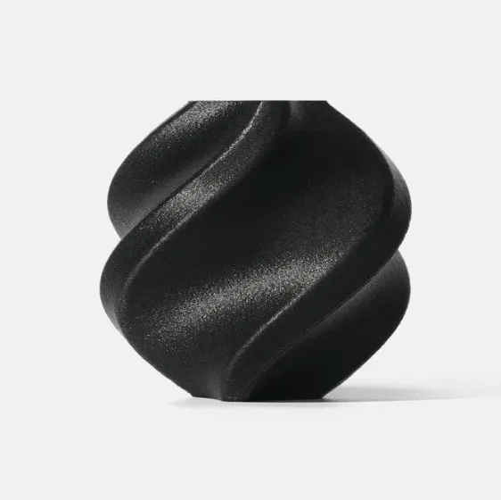 Black spiral-shaped 3D printed sample made with Bambu Lab PET-CF filament