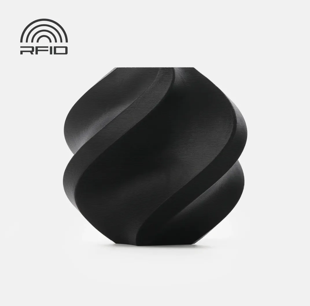Black printed object made from PETG-HF filament on white background with RFID logo