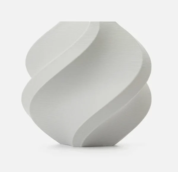 Gray 3D printed object produced using Bambu Lab PLA Lite Gray Filament 1.75mm, showing smooth curves, fine layer lines, and even color finish, Color Code 16101.