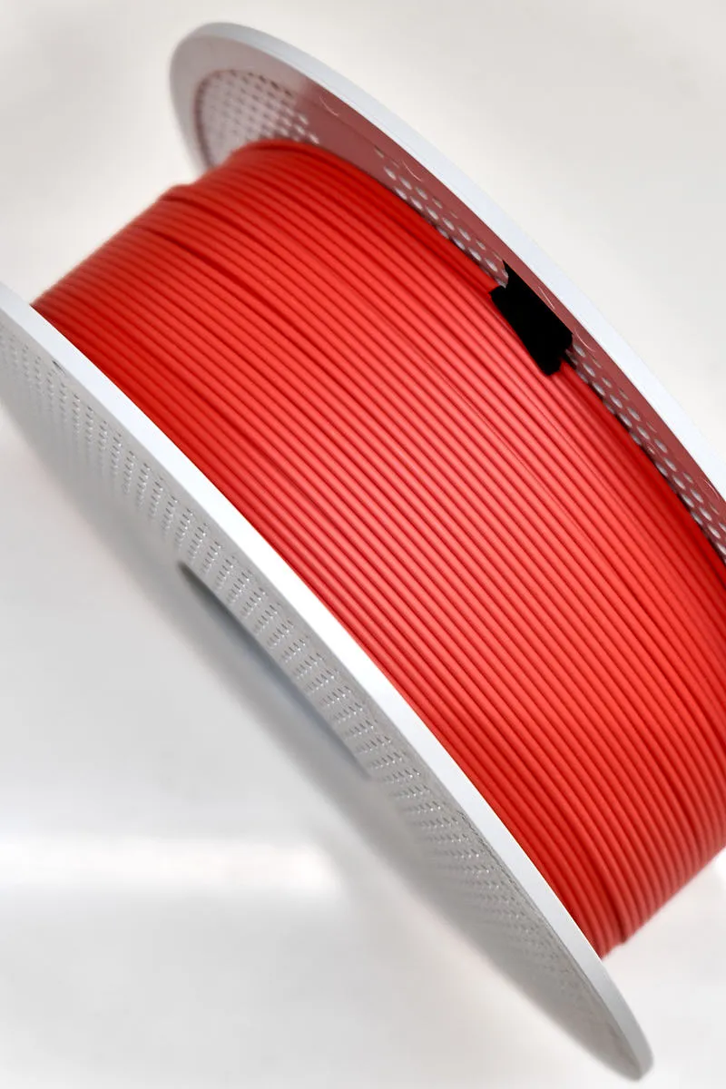 Vertical close-up of Bambu Lab PLA Lite Red Filament 1.75mm showing consistent extrusion lines and smooth filament texture, Color Code 16200.