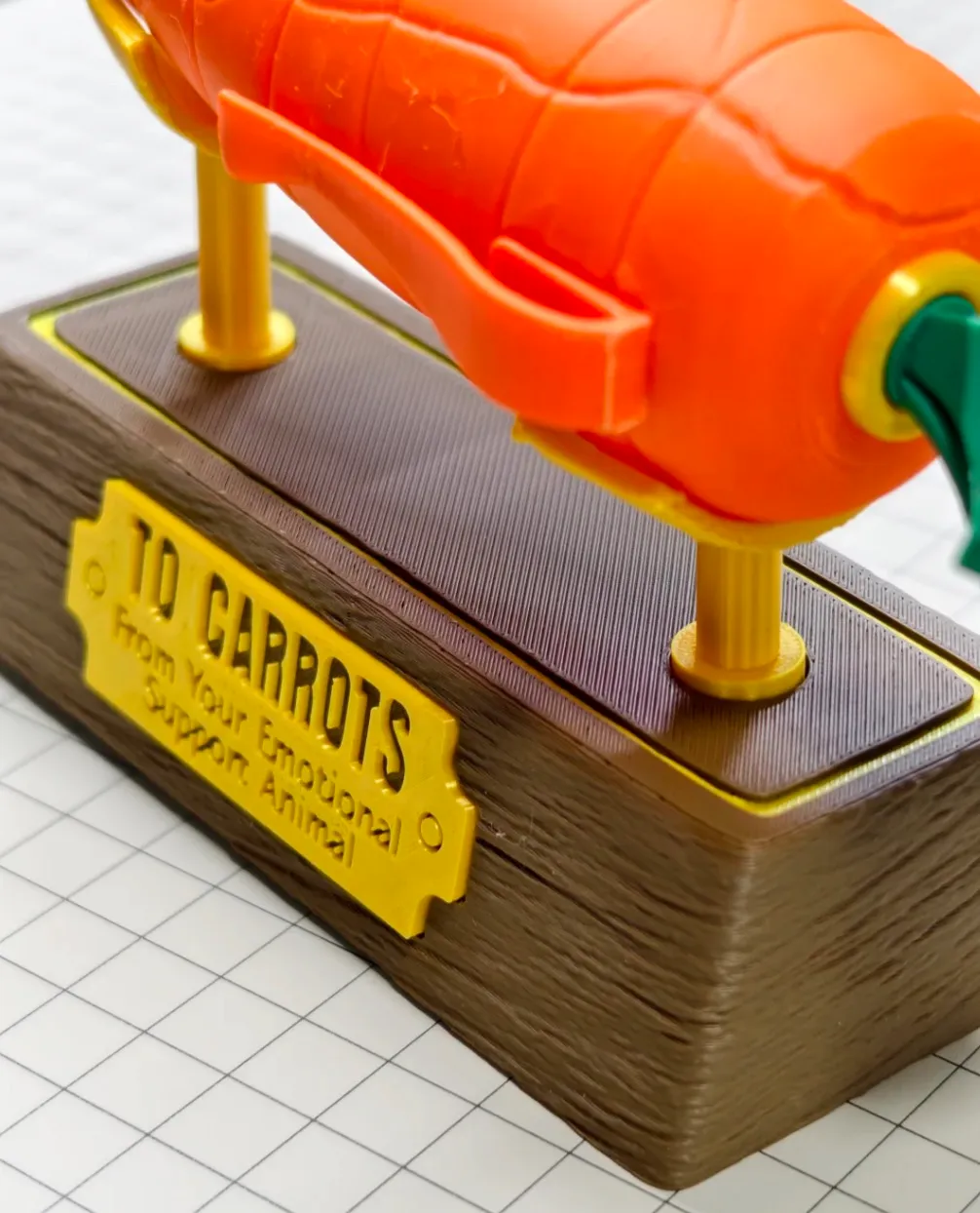 3D printed display base made with PLA Basic Cocona Brown filament, featuring wood-like texture, layered finish, and warm brown color tone