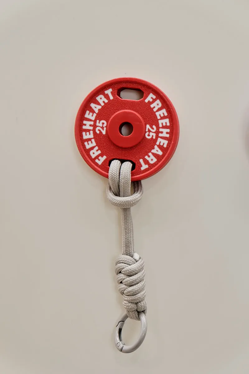 Round 3D printed tag in maroon red made with Bambu Lab PLA Basic Maroon Red filament 1kg color code 10205