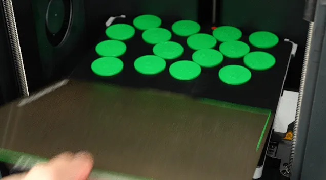 3D printed parts automatically releasing from textured PEI build plate after printing is completed and plate is flexed