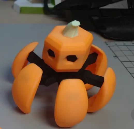 Modular pumpkin-shaped 3D printed parts made with Bambu Lab PLA Basic Pumpkin Orange filament 10301