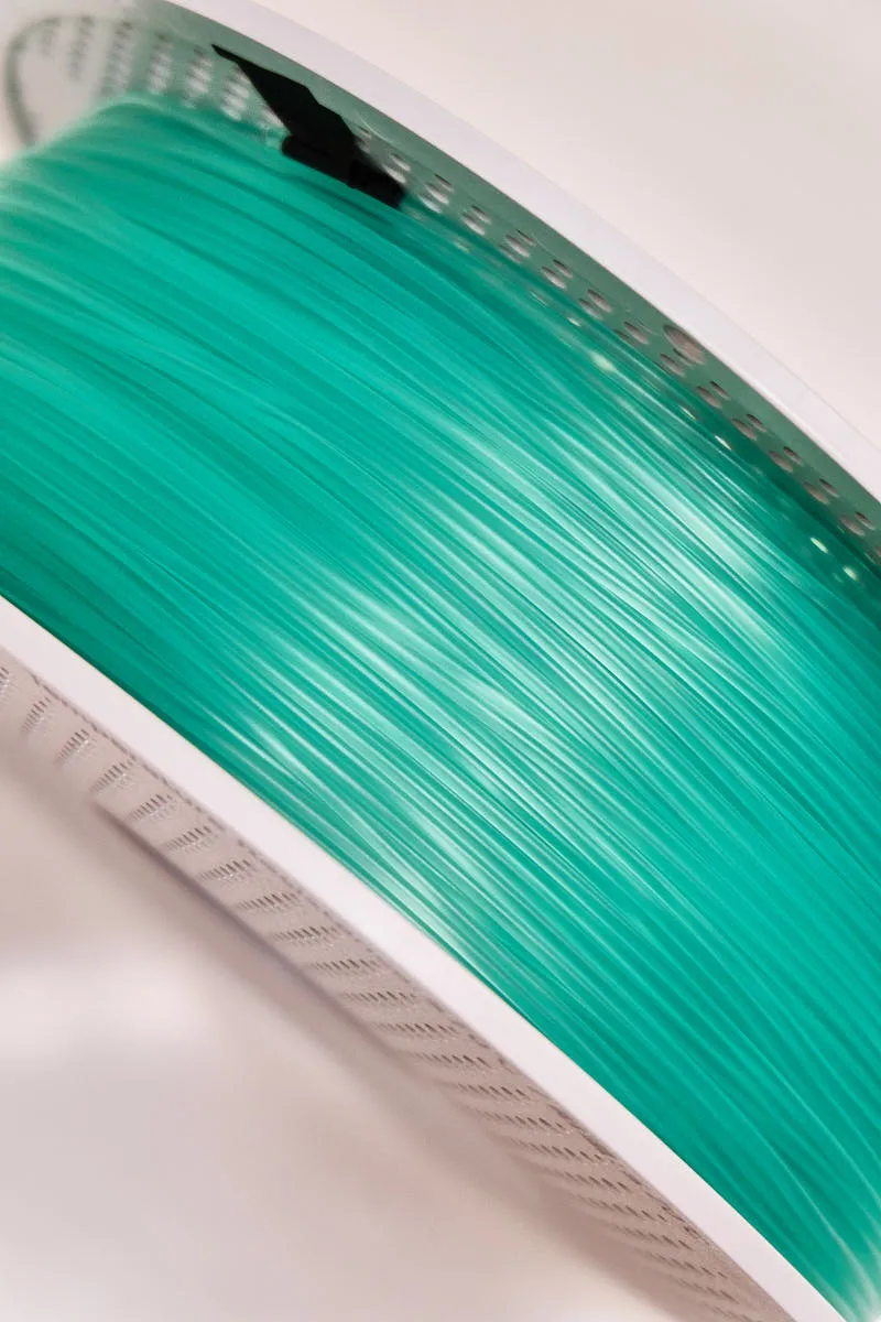 Close-up of Bambu Lab PLA Translucent Light Jade filament 13510 showing smooth surface, consistent diameter, and translucent light jade color