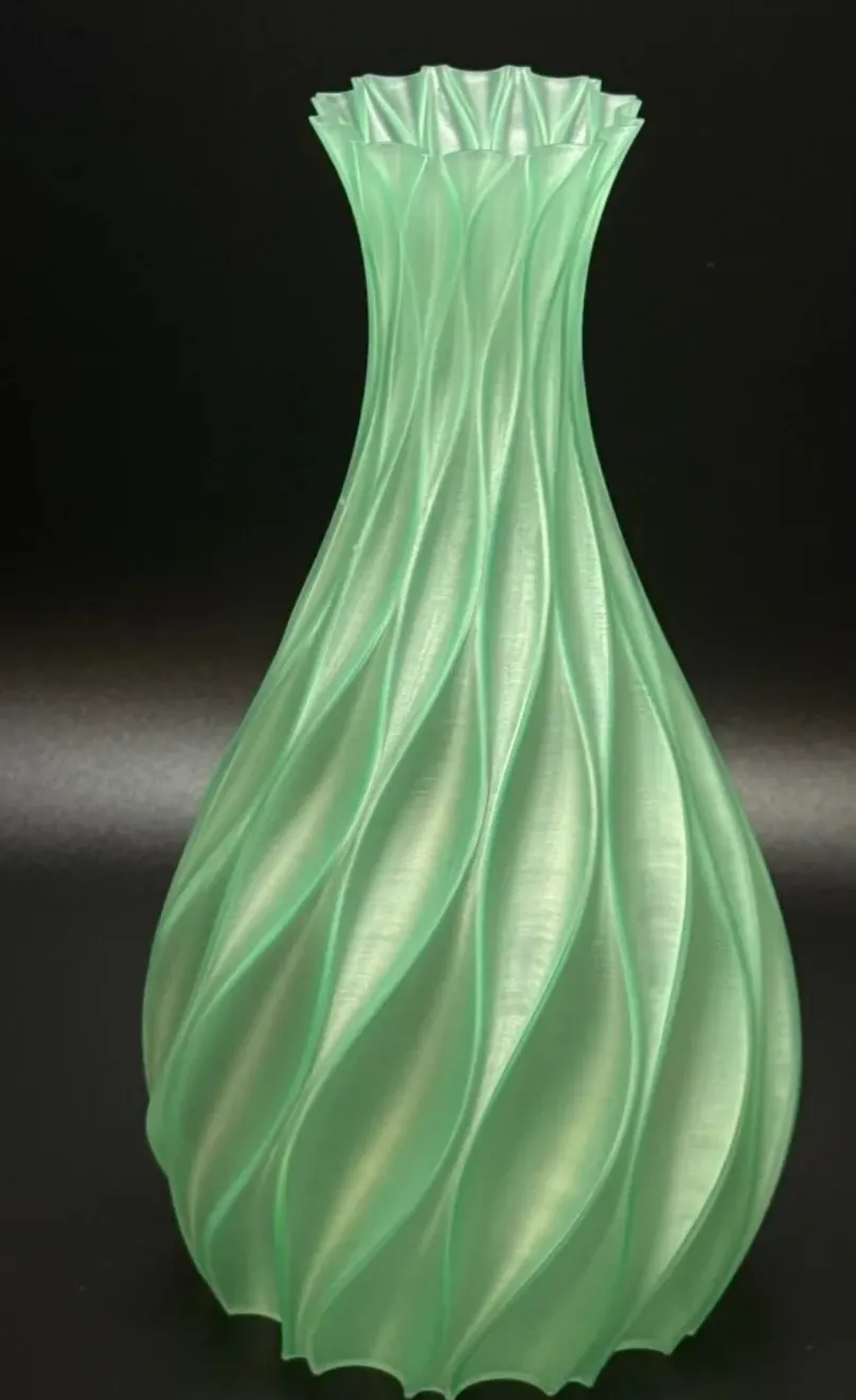 Decorative vase printed with Bambu Lab PLA Translucent Light Jade filament 13510, showing smooth curves and light-diffusing translucency