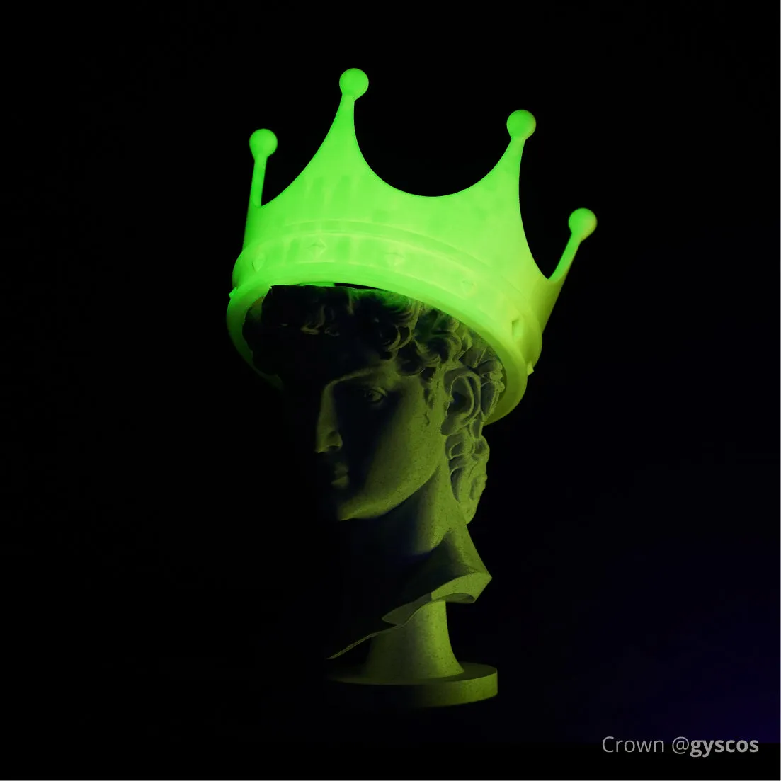 Glow-in-the-dark crown accessory printed with Bambu PLA Glow filament, glowing green on a classical sculpture bust