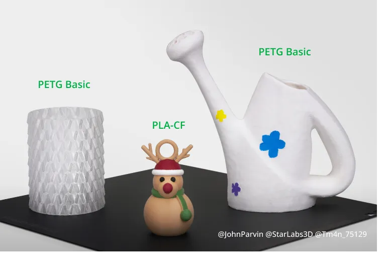 3D printed models made with PETG Basic and PLA-CF on Bambu Smooth PEI build plate, demonstrating material compatibility and stable adhesion