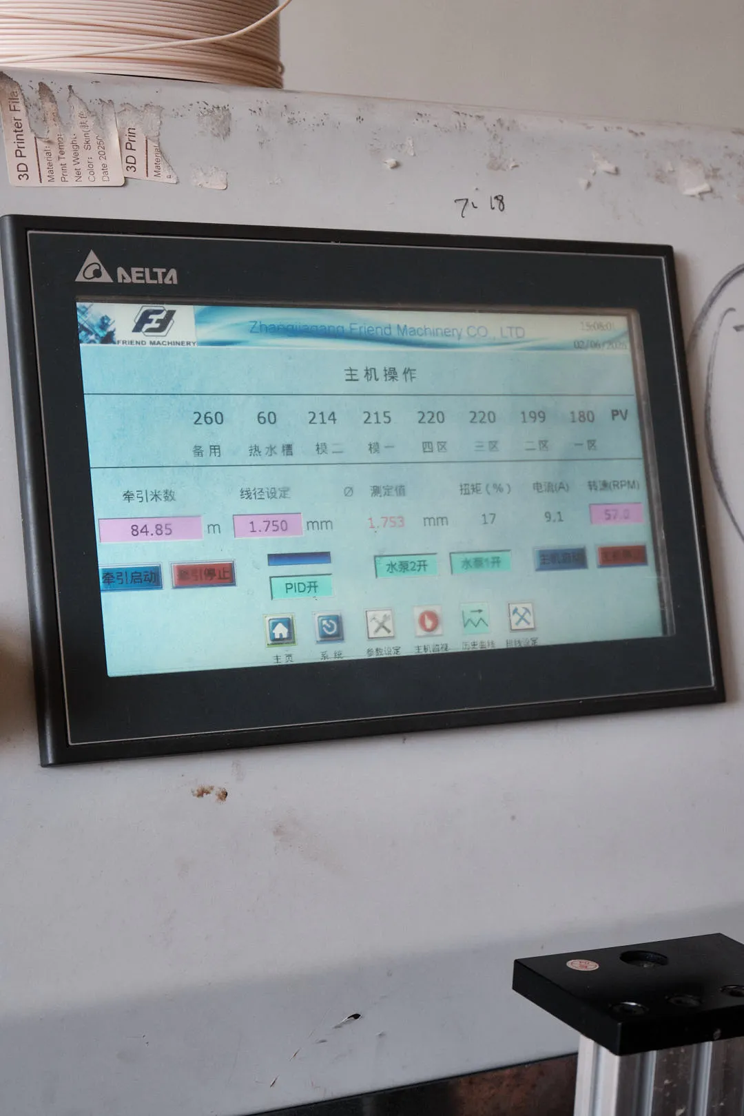 Filament extrusion machine control panel displaying diameter settings, temperature zones, and real-time production data