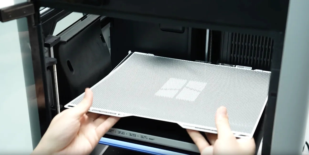 Removing the Vision Encoder calibration plate from the Bambu Lab H2 series printer by hand