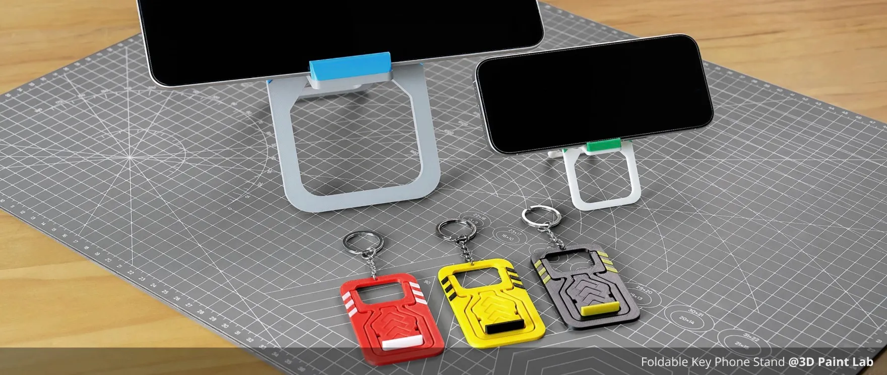Foldable phone stands and keychain accessories 3D printed using PLA Basic filament in multiple colors