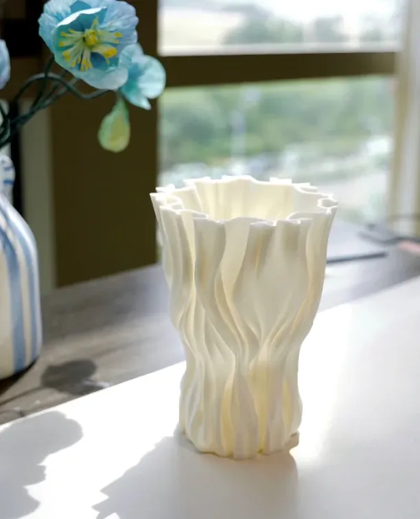 High-precision white PLA vase printed with Creality Hyper Series PLA White filament, demonstrating sharp edges and uniform layers