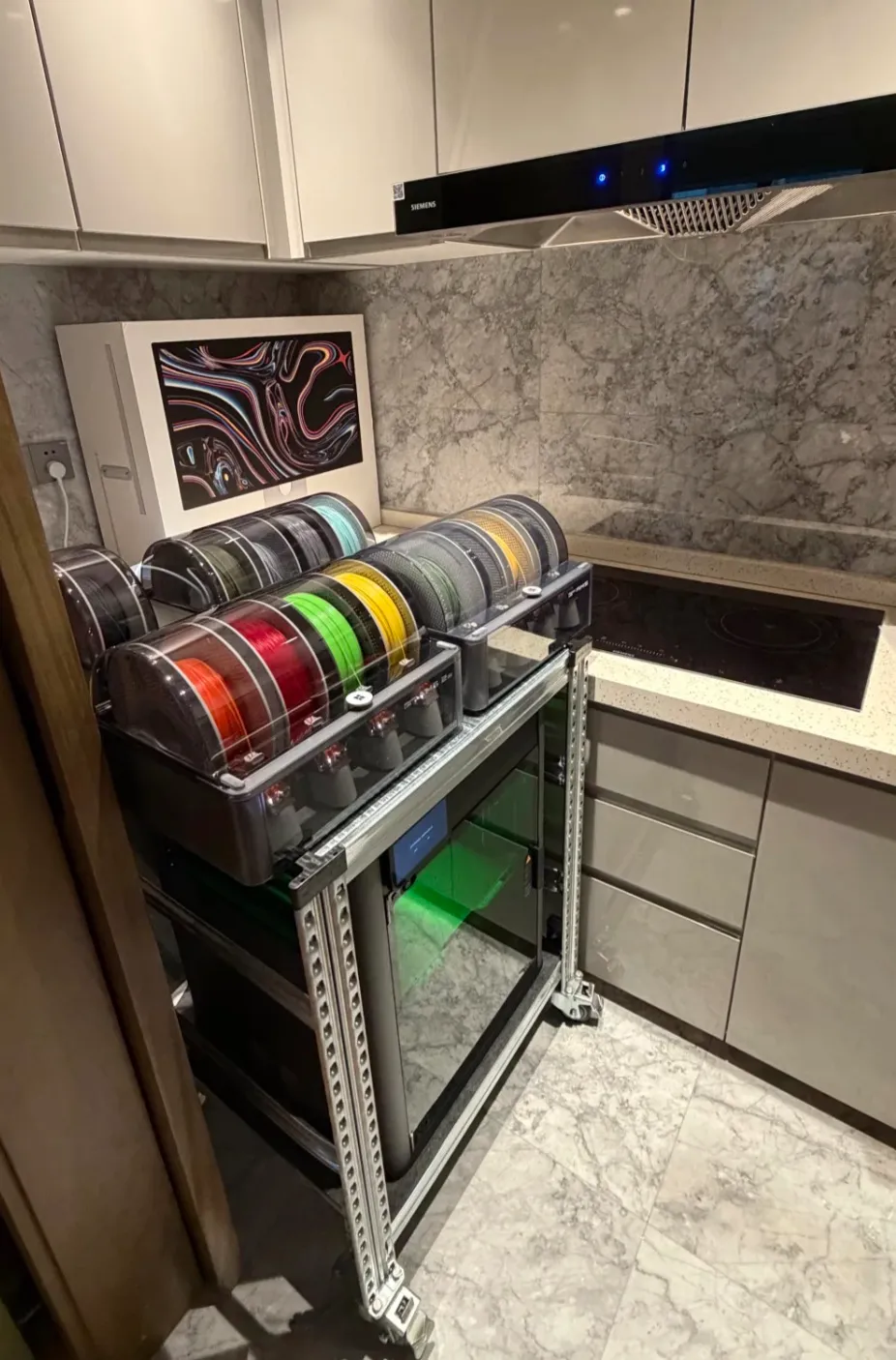 3D printer placed in a kitchen environment without full enclosure or professional ventilation