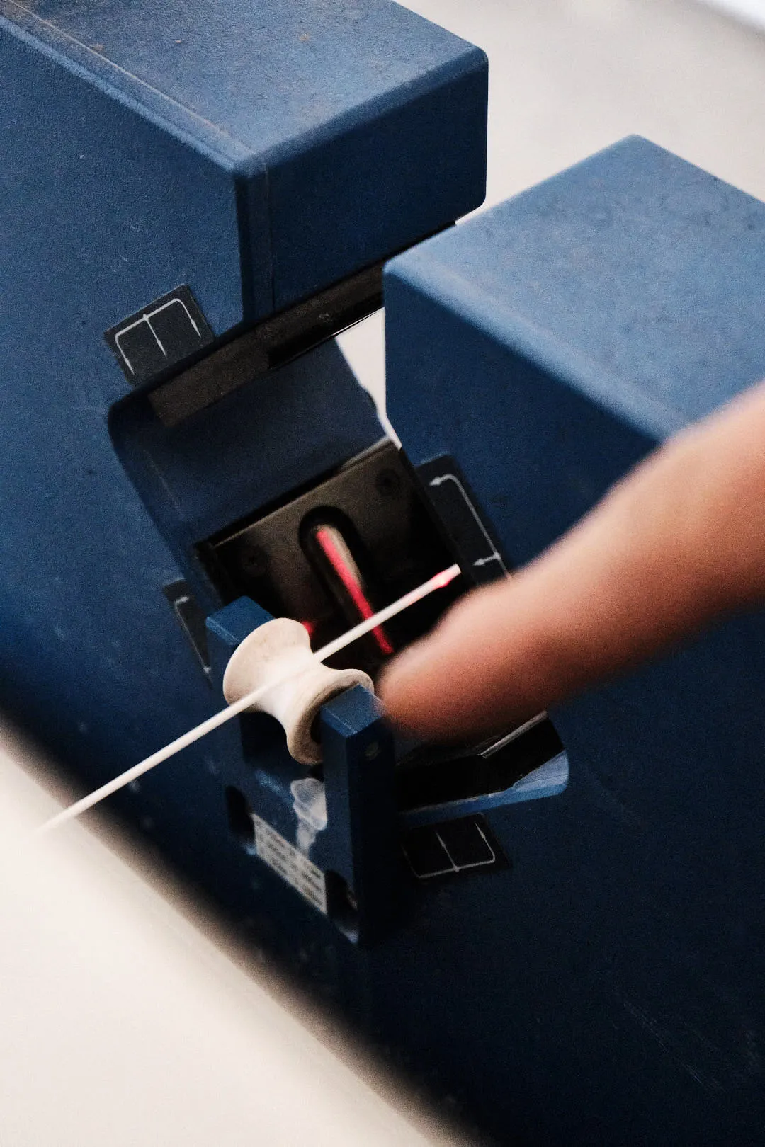 Laser system measuring 3D printer filament diameter during manufacturing process