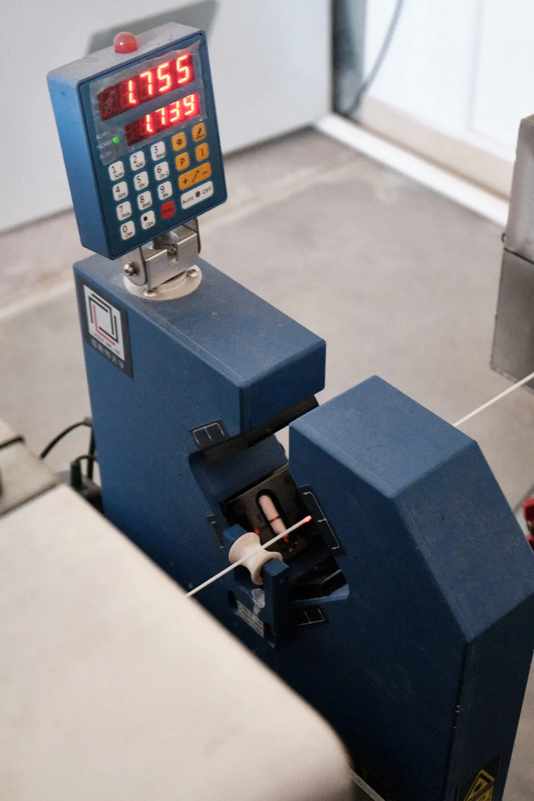 Online diameter measurement system used in 3D printing filament production at Voxelfuse3D factory