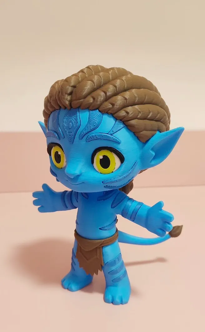PLA Basic Cyan filament 3D printed blue character figure with brown hair and yellow eyes