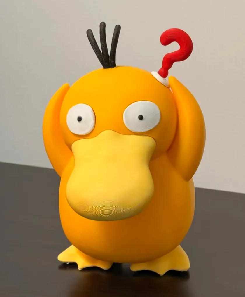 3D printed yellow cartoon duck figure made with PLA Basic Sunflower Yellow filament 10402