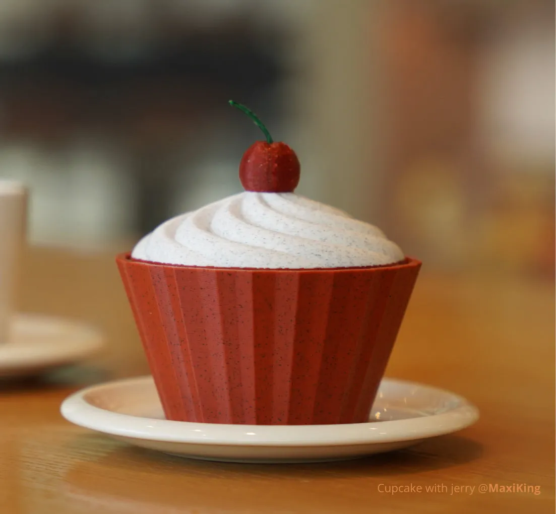 Cupcake model 3D printed with PLA Marble filament 13103 featuring red marble cup and white topping