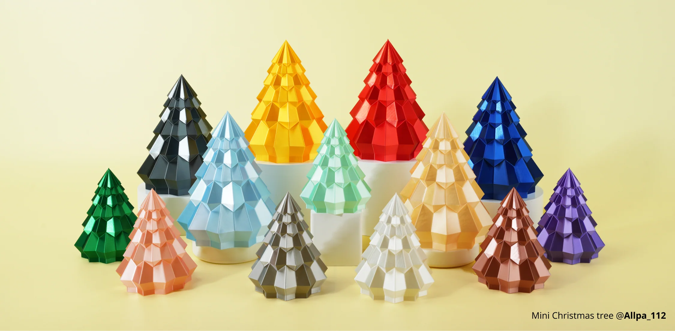 Colorful mini Christmas tree models 3D printed with Bambu Lab PLA Silk+ filament