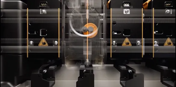 Close-up of Snapmaker U1 SnapSwap toolhead switching mechanism with central locking gear