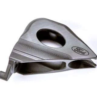 Automotive brake component manufactured using EPX 82 high-strength resin, featuring complex geometry and precision engineering details.