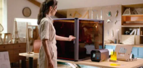 Snapmaker Artisan desktop machine placed in a studio workspace