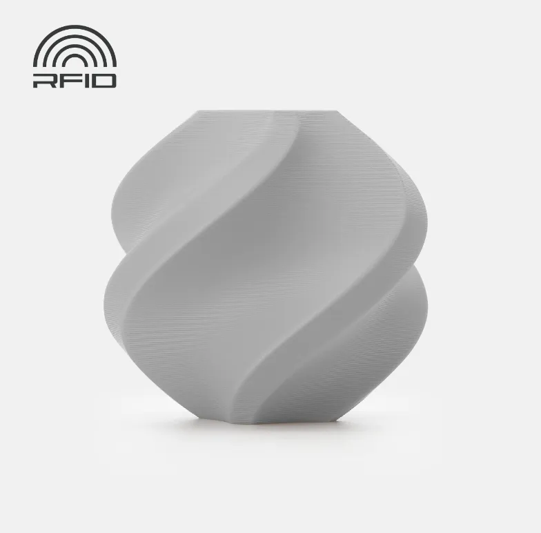 swirl vase 3D print sample produced with Bambu Lab PLA Tough+ Gray Filament 1.75mm 1kg Spool Color Code 12105 showing smooth layers and matte gray surface