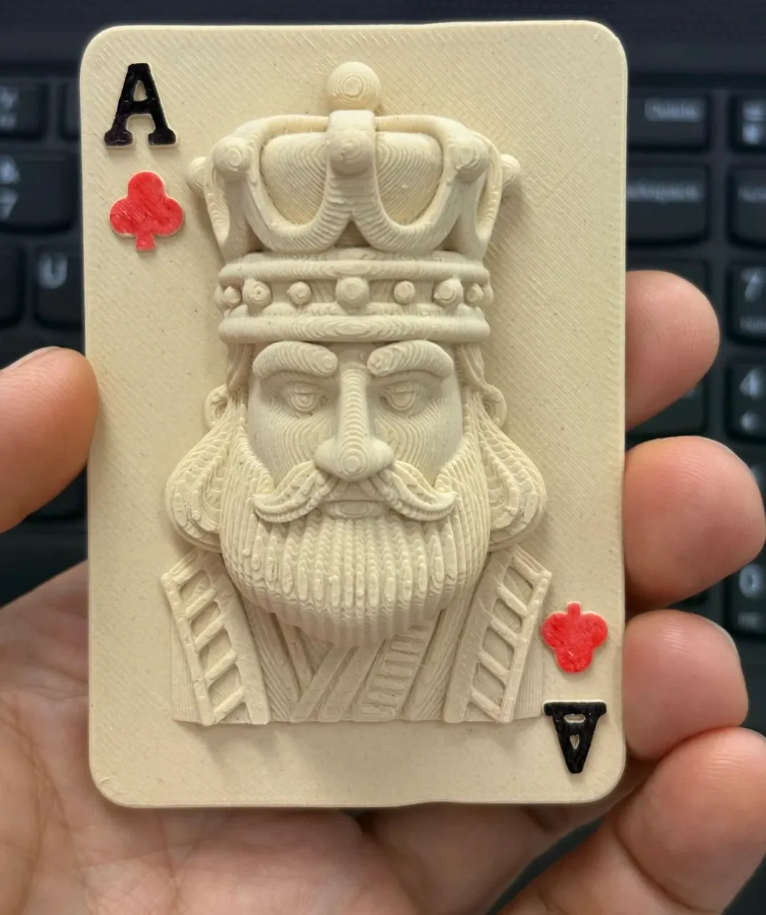 King playing card relief 3D printed using Bambu Lab PLA Wood White Oak Filament with Spool (Color Code 13106) showing detailed wood-like texture